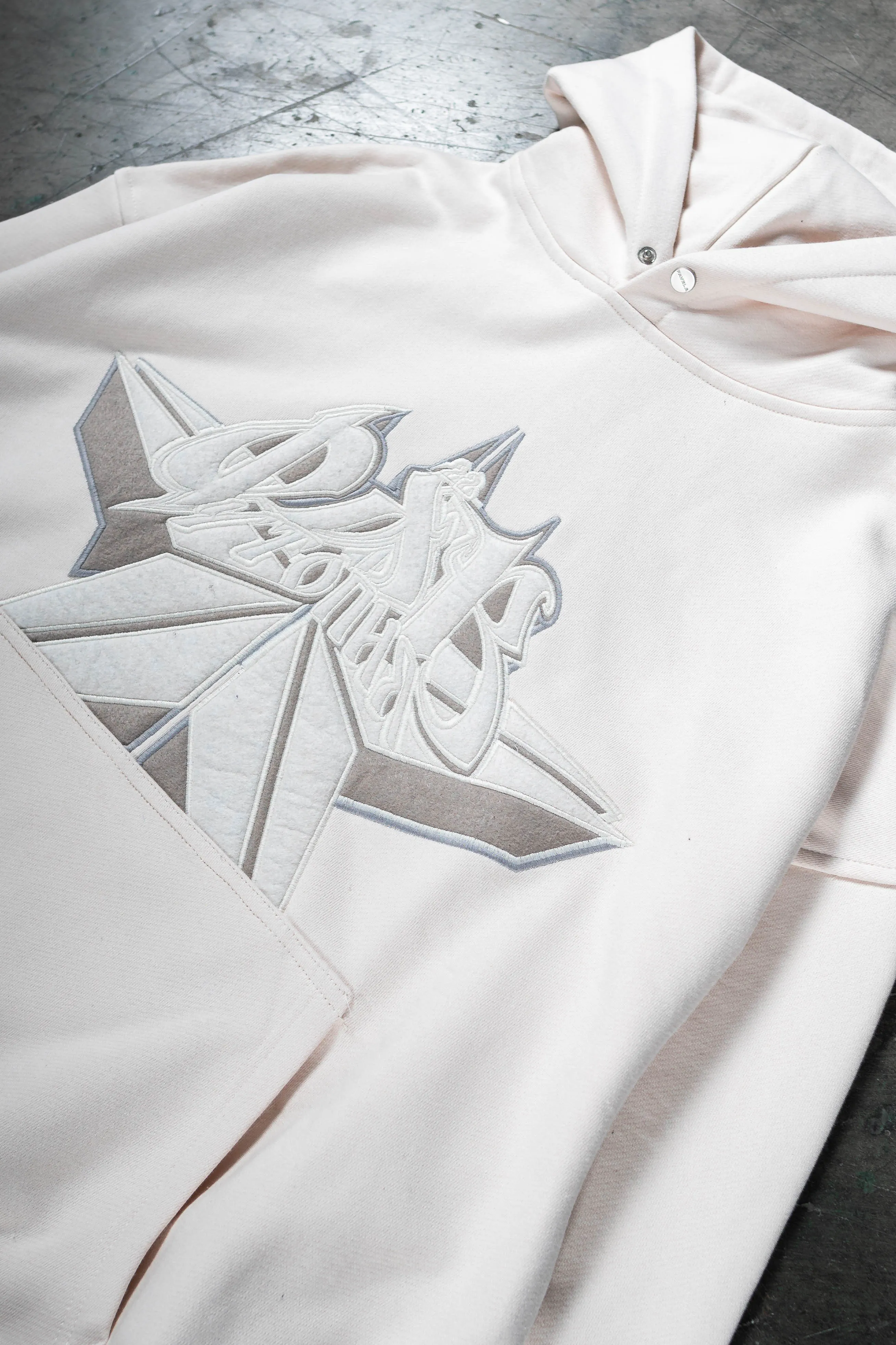 Off-White Snap Button Hoodie in Cyrillic Star Design